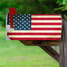 an american flag painted on the side of a mailbox