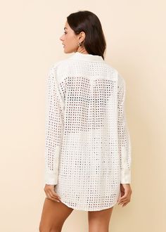 Our best-selling Oxford Tunic is back in a new leaf eyelet. Featuring a center front button closure, a functioning patch pocket, button closure on the cuff, and a hanger loop on the back, this eyelet top offers all the versatility you need. Spring White Blouse With Snap Buttons, White Blouse With Snap Buttons For Spring, Long Sleeve Eyelet Blouse For Daywear, White Button-up Eyelet Blouse, White Eyelet Button-up Blouse, Eyelet Top, Solid & Striped, New Leaf, Patch Pocket