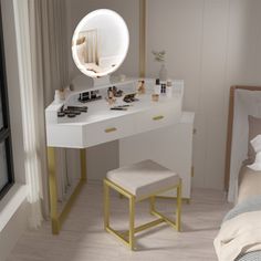 a bedroom with a vanity, stool and mirror on the wall next to a bed