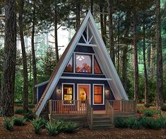 a - frame cabin in the woods with stairs leading up to it