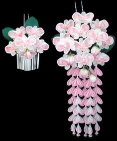 pink and white flowers are hanging from the ceiling