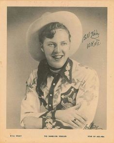 an old black and white photo of a man wearing a cowboy hat with his arms crossed