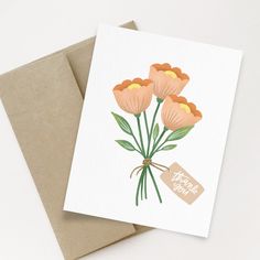 two greeting cards with flowers on them, one has a tag that says happy birthday