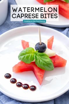 watermelon caprese bites on a white plate with blueberries and basil