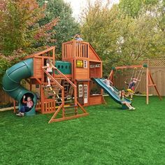 children playing in the backyard with wooden playset and climbing frame, swing set and slide