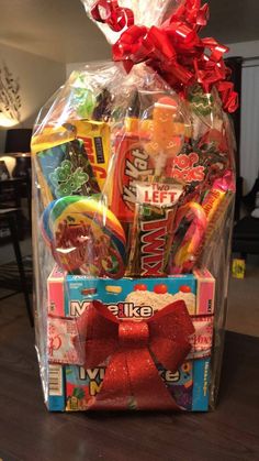 a gift basket with candy and candies in it