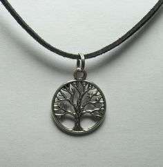 "You are buying the necklace pictured. This has a 7/8\" X 3/4\" tree of life charm on a 16\" (with lobster clasp and 2\" chain extender) black faux suede cord. I also have this done as earrings so make sure to look around my shop for other great finds. International buyers please contact me before buying to discuss S/H." Tree Of Life Jewelry, Tree Necklace, Tree Of Life Necklace, Suede Cord, Tree Of Life Pendant, Chain Extenders, Metal Charm, Dream Jewelry, Piercing Jewelry