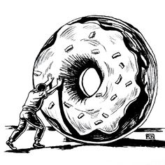 a man pushing a giant doughnut on top of it