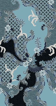 a blue and black pattern with white birds on it's back ground, in the middle of an intricate design