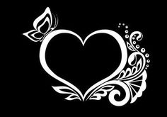 a white heart with flowers and leaves on a black background