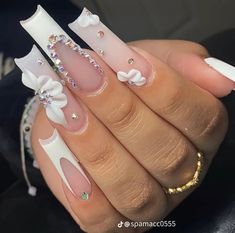 White Nails With Flowers And Rhinestones, Pink French Tip Nails Acrylics Long With Gems, Long Pink French Tip Nails With Rhinestones, Acrylic Nails With 3d Flowers And Gems, Pink Flower Quince Nails, Gem Nail Designs, Spring Acrylic Nails, Hippie Nails, Nails Now