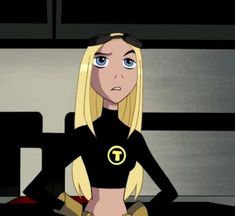 an animated image of a woman with blonde hair and blue eyes in a black outfit