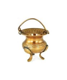 a gold colored metal pot with handles on it's legs and an ornate handle