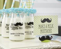 there are some milk bottles with mustaches on them