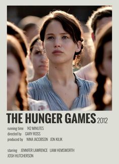 the poster for the upcoming film, the hunger games 2012 is shown in front of a group of people