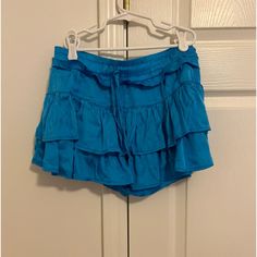 Blue Mini Skirt || Never Worn || Size: Xs || Blue Skirt For Day Out, Blue Lined Skirt Shorts For Beach, Blue Tiered Skirt For Vacation, Blue Tiered Skirt For Day Out, Blue Mini Skirt Bottoms For Summer, Blue Mini Skirt For Vacation, Blue Short Summer Skirt, Blue Tiered Skirt Skort For Day Out, Blue Tiered Skort For Day Out