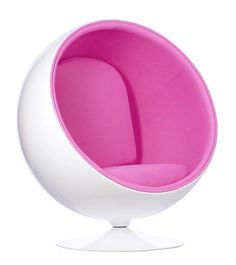 a white and pink ball chair sitting on top of a table