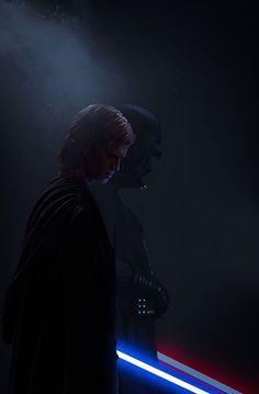 two people dressed as darth vader and sit in the dark with lights behind them