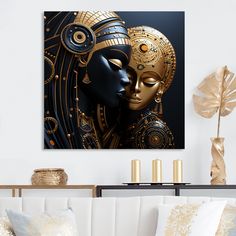 a black and gold mask on a white wall in a living room with couches