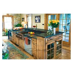 a large kitchen island with two sinks in it