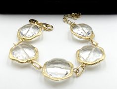 "Vintage gold tone and crystal link bracelet, In very good condition. It's 7' 12/ long Extend 2\" long. 7/8\" wide. Weighs 1 Oz. Thanks." Gold Faceted Crystal Bracelet, Adjustable Gold Crystal Bracelet Costume Jewelry, Gold Crystal Bracelet With Faceted Details, Gold Crystal Bracelet Costume Jewelry, Elegant Gold Crystal Bracelet With Chain, Gold Crystal Costume Bracelet, Swarovski Brooch, Sterling Silver Marcasite, Moon Stone