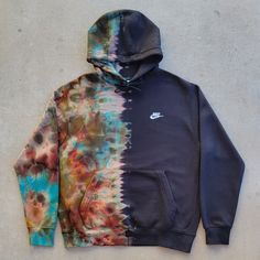 This hoodie has gone through a process where dye of the original garment has been removed and then dyed with professional, long lasting, fiber reactive procion dyes and ice to create a watercolor effect! * Machine washed with professional textile detergent. Details: *Embroidered logo front left side *Kangaroo pocket *Ribbed hem and cuffs *Hood with drawstring *Fleece *80-82% cotton/18-20% polyester Washing Instructions: Machine wash on delicate setting, inside out with mild detergent and cold wa Acid Wash Bleached Hoodie For Streetwear, Acid Wash Hoodie For Streetwear, Casual Hand Dyed Acid Wash Hoodie, Casual Hand-dyed Acid Wash Hoodie, Casual Acid Wash Hand Dyed Hoodie, Casual Bleached Hooded Hoodie, Hand Dyed Acid Wash Hoodie, Acid Wash Hand Dyed Hooded Hoodie, Acid Wash Hand Dyed Hoodie