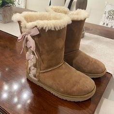 Worn Only A Few Times And Generally In Excellent Used/Like New Condition Except For Some Minor Wear To Front Of Left Boot As Pictured. Women’s Ugg Bailey Bow Ii, Chestnut With Pink Satin Bows. Uggs 2000s, Pink Uggs With Bows, Pink Winter Outfit, Cute Uggs, Ugg Bailey Bow, Pink Uggs, Platform Shoes Heels, Bailey Bow Uggs, Ugg Bailey