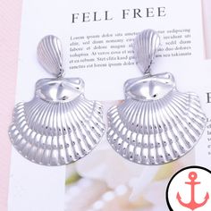 Big Metal Shell Earrings: Perfect for the Passionate Sea Lover Introducing our stunning Big Metal Shell Earrings, the perfect accessory for anyone who has a deep love for the sea and its enchanting symbols. These earrings are part of our popular Shell Earrings collection, where you can find a wide variety of nautical-themed earrings that will make you feel like you're always close to the ocean. Whether you're attending a beachside party or simply want to add a touch of the sea to your everyday s Silver Ocean-inspired Earrings For Gifts, Shell-shaped Metal Earrings, Metal Shell-shaped Earrings, Elegant Beach Jewelry Made Of Alloy, Metal Shell-shaped Earrings For Gifts, Shell-shaped Metal Earrings For Gift, Elegant Nickel-free Beach Earrings, Silver Ocean-inspired Earrings, Elegant Nickel-free Earrings For The Beach