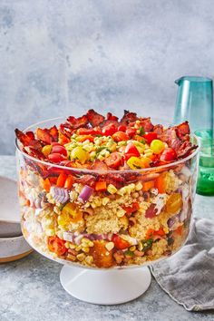 a large glass dish filled with lots of food