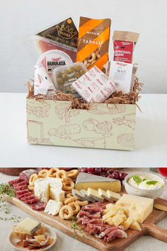 an assortment of cheeses, crackers and meats in a wooden box on a table