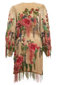 With every silhouette, Gucci seeks a way to reimagine or redefine it. The label updates a floral motif with fully embroidered beadwork adorning the body of this nude long sleeve dress. Intricately boasting an elegant and elevated design, the decorations fall to a beaded fringe that hangs from the hem of the garment for Beaded Fringe Dress, Dora Maar, Gucci Floral, Blouson Dress, Fringe Dress, Block Printing Fabric, Silk Embroidery, Beaded Fringe, Long Sleeve Mini