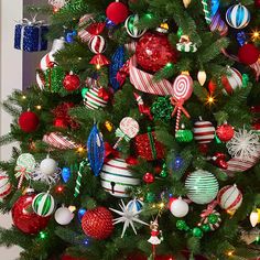 a decorated christmas tree with candy canes and ornaments