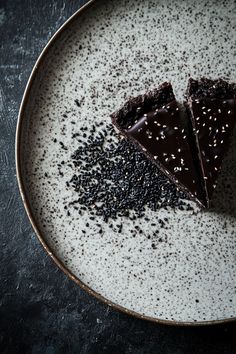 Indulge in a luxurious black sesame and dark chocolate tart with a velvety filling and a crisp crust. Perfect for sophisticated dessert lovers. #BlackSesame #ChocolateDesserts #ArtisanBaking