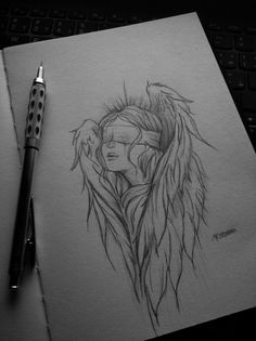 a pencil drawing of a woman's face with long hair and an angel wing