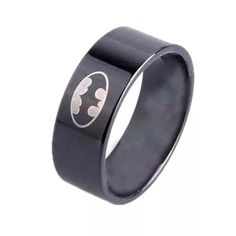 the batman symbol is engraved on this black ring