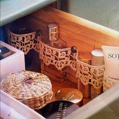 an open drawer filled with lots of personal care items and knick - knacks