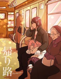 two people sitting on a train next to each other and one person holding a baby