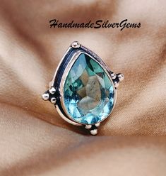 Aquamarine Ring, 925 Silver Sterling Ring, HandmadeJewelry, Pretty Ring, Silver Ring, Aquamarine Jewelry, Gemstone Pendant, gft for moms. Gemstone -Aquamarine  Gemstone Shape -Pear   Metal-925 Sterling Silver Customization: After you order, we will craft your selected ring as per your required ring size. Ring size chart is also uploaded. Handling Time We will dispatch your item within 1-2 Weeks aftor confirmation of order. Shipping: Domestic Shipping We use Royal Mail UK/Hermes/DPD etc as for ou Teardrop Sapphire Ring In Sterling Silver, Teardrop Sapphire Ring In Sterling Silver Gift, Sterling Silver Teardrop Topaz Ring Gift, Handmade Sterling Silver Topaz Ring For Anniversary, Pretty Ring, Aquamarine Pendant, Aquamarine Jewelry, Sterling Silver Jewelry Handmade, Aquamarine Ring