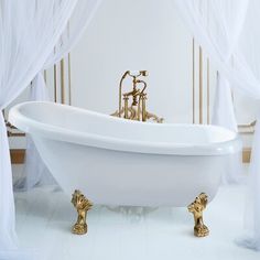 an ornate claw foot bathtub in a white bathroom