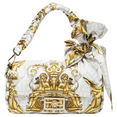 The exclusive Fendace collaboration boasts this baguette in silk canvas, a testament to luxury with its white and gold palette, and the coveted gold-tone hardware. SPECIFICS Length: 10.6" Width: 2.0" Height: 5.9" Strap Drop: 7" Comes with: Dustbag, Long Strap Luxury Baguette Shoulder Bag With Gold-tone Hardware, Fendi X Versace Bag, Luxury White Baguette Bag, Luxury Gold Baguette Bag, Versace X Fendi Bag, Luxury White Baguette Bag With Gold-tone Hardware, Fendace Handbags, Fendi X Versace, Fendi Shoulder Bag