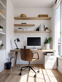 a desk with a computer on top of it in front of a window and bookshelves