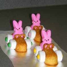 some little pink bunnies with bunny ears on them