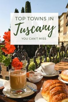 there is a sign that says top towns in tuscany you can't miss