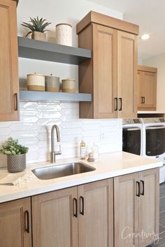 the kitchen is clean and ready for us to use in its new owner's home