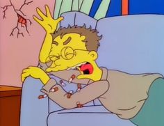 the simpsons character is sitting in a chair with his mouth open and hands on his chest