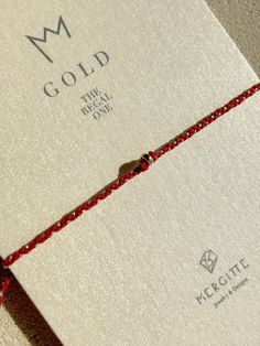 ◖ Details◗ ‣ 14kt Solid Gold Bead  -rondelle 3mm-  ‣ Italian Red String & Gold Metallic String (A quality) ‣ Adjustable double closure  ‣ Hand knotted ‣ This Beaded Bracelet is placed in our elegant black Mergitte Designs Envelope on it's special 'Gold' card, coming with a Thank you card ready for gift giving.  ◖ We Love focusing on Details, using only High Quality Materials, so to make our jewelry so Special and Unique! ◗ ◖ Shipping & Packaging ◗ ‣ All orders will be shipped via tracked shippin Gift Red 14k Gold Bracelet, Minimalist 14k Gold Red Bracelets, Minimalist Red 14k Gold Bracelets, Red 14k Gold Dainty Bracelet, Minimalist Red 14k Gold Bracelet, Red Gold Jubilee Bracelet For Gift, Red Jubilee Gold Bracelet Gift, Elegant Tiny Beads Friendship Bracelets As Gift, Red Bracelets With Tiny Beads As Gift