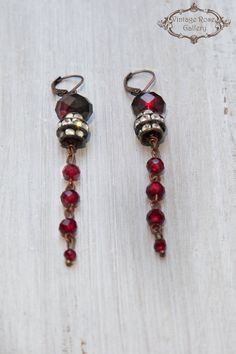 Boho Chic Earrings, Long Dangle Earrings , Red Burgundy Earrings, Gift for Her , Antique Rhinestones Features different shapes of red Burgundy crystal beads with an interesting transparency and antique rhinestones . Measures approx. 3'' - 7,5 cm long With copper lever back ear hooks. Bohemian but also classy and elegant those earrings are for special occasions ... 🌹Select from VintageRoseGallery as many items as you like at the SAME SHIPPING COST Your order will be shipped REGISTERED and with f Red Dangle Clip-on Earring, Red Dangle Single Clip-on Earring, Red Handmade Dangle Crystal Earrings, Red Metal Dangle Earrings, Red Handmade Crystal Dangle Earrings, Red Vintage Dangle Chandelier Earrings, Handmade Red Crystal Dangle Earrings, Vintage Red Dangle Chandelier Earrings, Red Vintage Chandelier Dangle Earrings