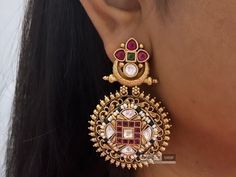 Discover the exquisite beauty of our Leela Ethnic Indian Earrings, a stunning blend of tradition and elegance. Handcrafted with meticulous attention to detail, these temple earrings are a testament to the rich heritage of Indian jewelry. Adorned with intricate designs inspired by temple architecture, these earrings exude timeless charm and grace. Crafted with high-quality materials and finished in radiant golden tones, these traditional earrings are perfect for adding a touch of Indian sophistic Traditional Earrings Indian Jewelry, Temple Earrings, Temple Jewellery Earrings, Jewelry Traditional, Temple Jewelry, Temple Architecture, Types Of Earrings, Earrings Indian, South Indian Jewelry