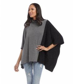 KAREN KANE Contrast Funnel Neck PonchO WOMENS  TAG SIZE: SMALL With its sweater knit fabrication and oversized fit, this poncho is perfect for transitional weather. It also features a cozy funnel neckline for additional warmth. DETAILS Elbow sleeve Length: 28 3/8 inches (size M) 63% Polyester 34% Rayon 3% Spandex Available in dark heather gray with black Made in Los Angeles, USA Dry clean or hand wash cold Funnel neck Handkerchief hem  IN NEW CONDITION -   THANKS FOR LOO Gray Long-sleeved Poncho For Layering, Gray Poncho For Layering, Gray Long Sleeve Poncho For Layering, Knit Poncho For Fall Layering, Fall Knit Poncho For Layering, Oversized Black Casual Poncho, Casual Oversized Black Poncho, Black Poncho With Batwing Sleeve One Size, Black Poncho With Batwing Sleeve