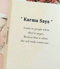 an open book with the words karma says on it